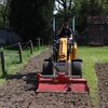 Knikmops-Grondfrees Knikmops-Grondfrees